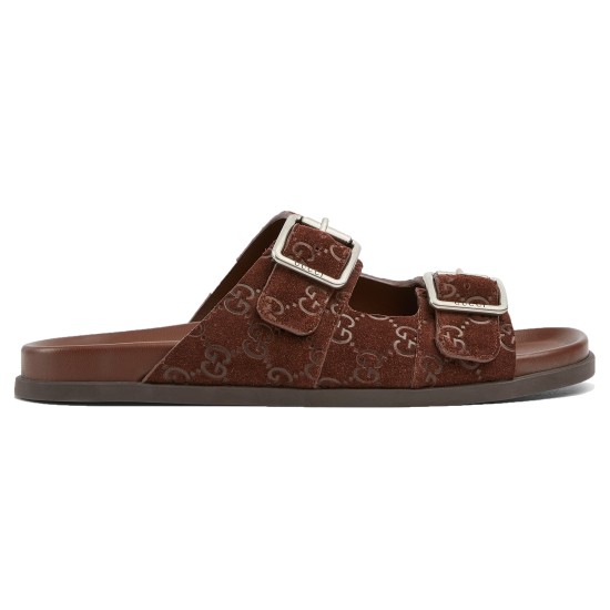 Profile view of brown Gucci slide sandals showing suede double straps and silver buckles