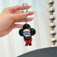 L Women's Vivienne Diver Charm In Hand Hand holding the L Women's Vivienne Diver Bag Charm to show size and clasp detail