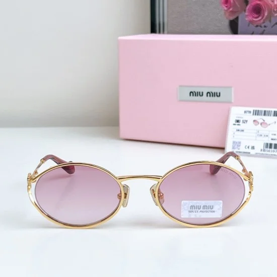 Miu Miu Women's Oval Frame Pink Gold Sunglasses Front View Miu Miu Women's Oval Frame Pink Gold Sunglasses front view