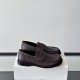 Loewe Men's Campo Penny Loafers Side Profile Side view of Loewe Men's Campo Deerskin Penny Loafers showing the embossed side tab and profile