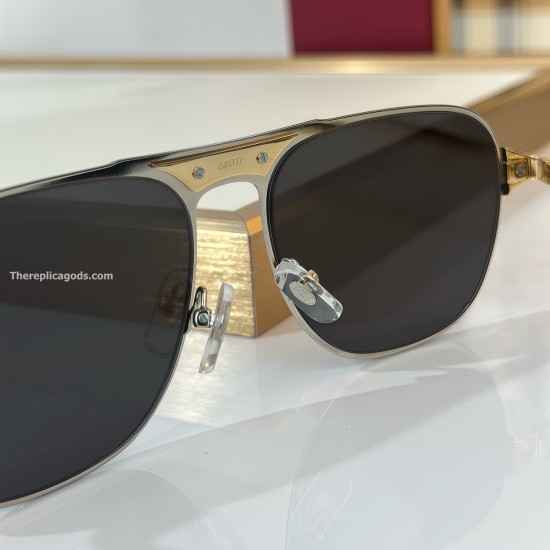 Close-up view of the bridge, nose pads, and engraved bridge size details on Cartier Men's Men Santos Sunglasses