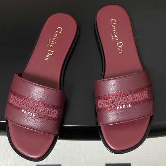 Overhead View of Dior Dway Burgundy Grained Calfskin Slides Top-down overhead view of the burgundy slides displaying the wide embroidered straps