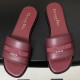 Overhead View of Dior Dway Burgundy Grained Calfskin Slides Top-down overhead view of the burgundy slides displaying the wide embroidered straps