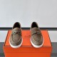 Hermès Men's Ignacio Suede Loafers in Étoupe Brown - Front View Hermès Men's Ignacio Suede Loafers in Étoupe Brown front view showing braided detail and toe shape
