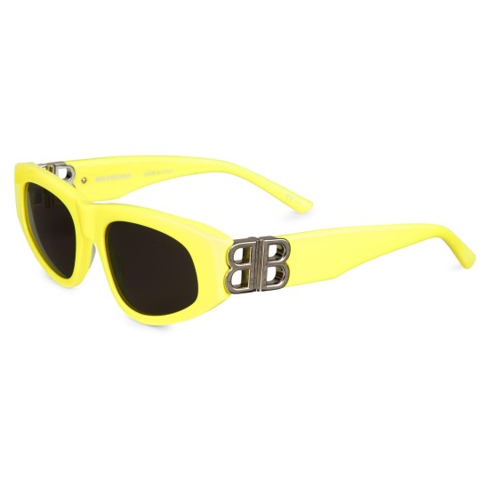 Balenciaga Women's Narrow Yellow Frame Sunglasses Three-Quarter View Three-quarter view of Balenciaga Women's Narrow Yellow Frame Sunglasses displaying dark lenses and silver BB hinge emblem