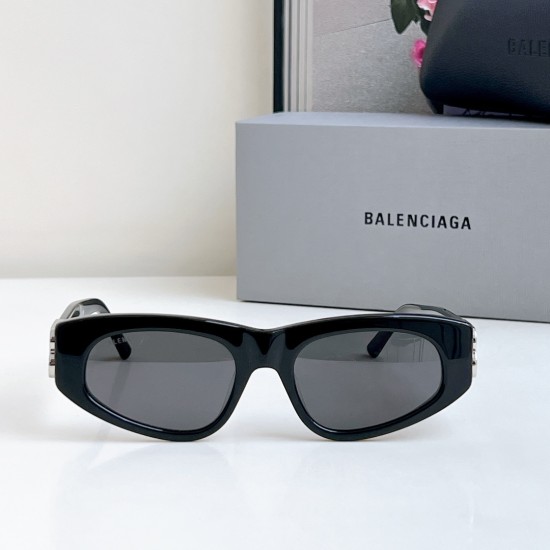 Front view of Balenciaga Women's Bossy Round Sunglasses detailing the black frame and dark tinted lenses
