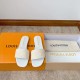 L Revival Flat Mules in white - Top View with Box Top-down view of L Revival Flat Mules in white presented alongside branded packaging