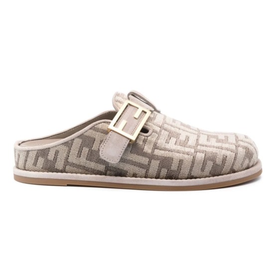 Side profile of Fendi beige jacquard logo slip on slippers Side profile view of the Fendi beige jacquard logo slip on slippers showing the buckle and patterned upper
