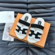 Hermes Chypre Sandals top-down view showcasing the black and ecru colourway