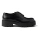 Prada Men's Brushed Leather Derby Shoes in black side profile view Side profile of Prada Men's Brushed Leather Derby Shoes in black displaying the chunky platform sole