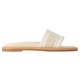 Side profile of white ecru L sandals Side profile view of the white ecru L sandals showing the cushioned strap and flat tan sole