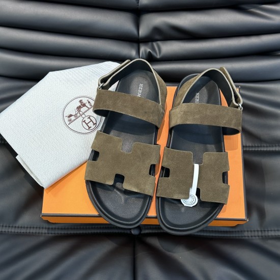 Hermes Etoupe Suede Flat Sandals Top Down View in black Hermes etoupe suede flat sandals top down view displayed with branded box and dust bag in black