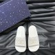 Gucci White Rubber Slide Sandals Pair Overhead View Front overhead view of both Gucci white rubber slide sandals showcasing the Interlocking G emblem