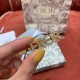 replica DIO(R)EVOLUTION BROOCH GOLD-FINISH METAL AND WHITE CRYSTALS UK