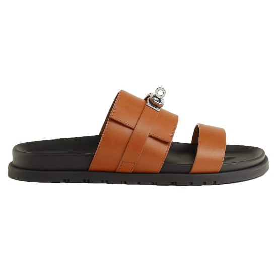 Hermes brown leather slide sandals side profile view in brown and silver Hermes brown leather slide sandals side profile view featuring silver hardware