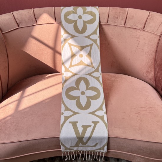 Front side of L Women's Medallion Brown Scarf draped vertically over a pink armchair in brown and white