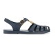 Gucci Blue Rubber Sandals Outer Lateral View in blue and white Gucci rubber buckle strap sandals in blue shown from the outer lateral side against a white background
