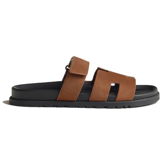 Hermes Brown Suede Sandals Lateral View in brown and white Side profile of Hermes brown suede sandals on white background