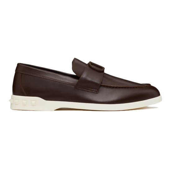 Valentino Men's brown leather loafer showing profile view with white sole and heel studs