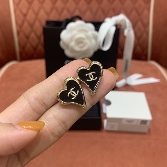 replica CHANEL METAL CC HEART EARRINGS IN GOLD AND BLACK UK