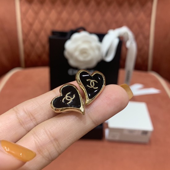 replica CHANEL METAL CC HEART EARRINGS IN GOLD AND BLACK UK