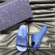 Gucci Light Blue Rubber Slide Sandals with Presentation Box Gucci light blue rubber slide sandals displayed next to a patterned presentation box
