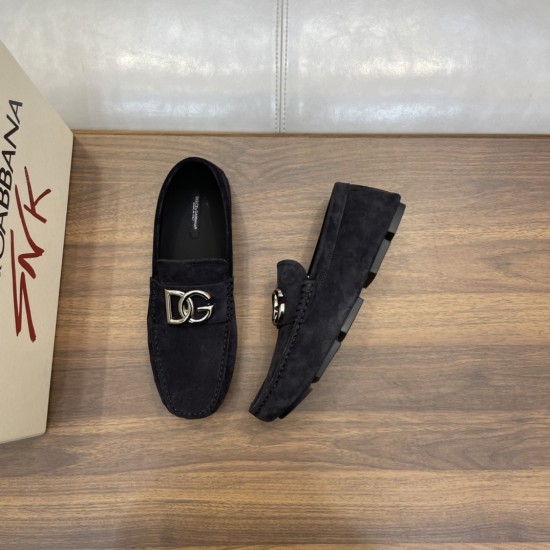 Dolce & Gabbana Men's Blue Suede Driver Shoes Pair Display in blue and silver Men's Top-down view of one blue suede driver shoe alongside its side profile on a wooden surface in blue and silver