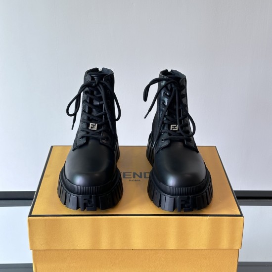 Front view of black Fendi Men's FF Jacquard And Leather Biker Boots Front view of black Fendi Men's FF Jacquard And Leather Biker Boots highlighting the lace-up closure and rounded toes