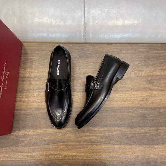 Ferragamo Men's Gancini Plaque Leather Loafers Black top-down view displaying insoles and side buckle detailing