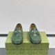 Men's Green Perforated Leather Horsebit 1953 Loafers Front View in green and silver Front view of Men's Green Perforated Leather Horsebit 1953 Loafers highlighting apron toe stitching and horsebit detail in green and silver