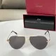 Cartier men's gold metal sunglasses front view with red presentation box and black case