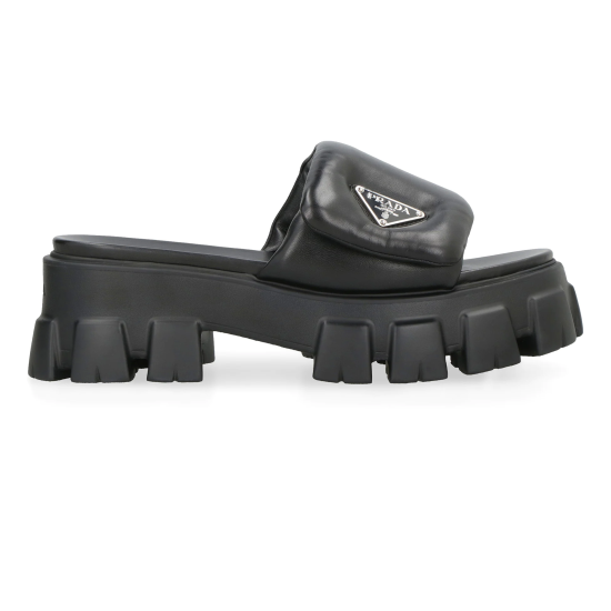 Prada Black Slide Profile View Profile view of Prada black nappa leather slide showing the chunky platform and padded strap