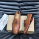 Christian Louboutin Men's Varsimoc Leather Loafers Brown pair display with red sole detail