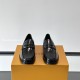 Front view of L Men's Patent Leather Loafers In Black showing apron toe detail