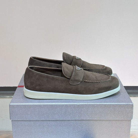Prada Men's Grey Suede Penny Loafers Pair View Pair of Prada Men's Grey Suede Penny Loafers resting on a grey shoe box
