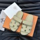 Hermes Chypre beige leather sandals top-down flat lay view