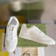 Gucci White Low-Top Trainers Standing View in white and gold Pair of white Gucci leather low-top trainers standing upright beside packaging in white and gold