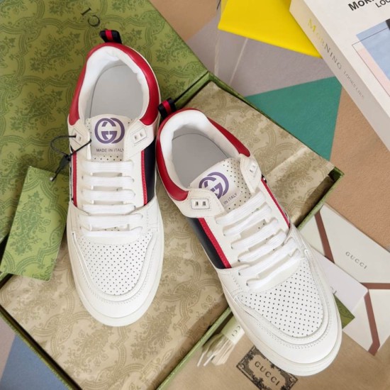 Angled top view of Gucci White Leather Low-Top Trainers With Red Trim showing tongue logo