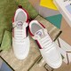 Angled top view of Gucci White Leather Low-Top Trainers With Red Trim showing tongue logo
