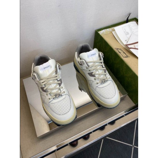 Gucci Distressed Leather Trainers Top-Down View in white and grey Top-down view of Gucci distressed leather trainers showing laces and padded collar in white and grey