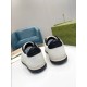 Gucci Mac80 Rear Heel View in off-white and black Rear view showing black leather heel tabs and textured soles of both trainers in off-white and black