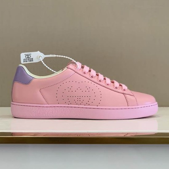 Gucci New Ace Perforated Leather Trainer Side Profile View in pink and purple Side profile view of Gucci New Ace perforated leather trainer in pink with purple heel tab