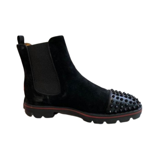 Christian Louboutin Men's Black Studded Suede Chelsea Boots Side Profile Side profile of Christian Louboutin Men's Black Studded Suede Chelsea Boots featuring spiked toe cap
