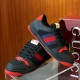 Gucci black and red web low top trainers pair angled display view