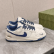 Gucci Low Top Leather Trainers In White And Blue Side Profile Gucci Low Top Leather Trainers In White And Blue side profile view on marble surface