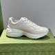 Side profile of off-white chunky leather trainer showing sculpted rubber sole