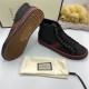 Gucci Off The Grid High Top Trainers Sole Detail in black and red Underside view showing patterned rubber sole of Gucci black high top canvas trainer in black and red