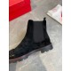 Christian Louboutin Men's Black Studded Suede Chelsea Boots Sole Close-Up Close-up profile of Christian Louboutin Men's Black Studded Suede Chelsea Boot showing heel and sole construction