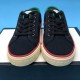 Gucci Off The Grid Black Canvas Trainers Front View in black and green Front view of both Gucci Off The Grid black trainers showing laces, tongue branding, and embossed toe bumpers in black and green