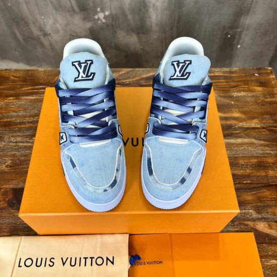 Top-Down View of L Bleached Monogram Denim Blue Low Top Trainers Direct top-down view of L bleached monogram denim blue low top trainers showing tongue logos